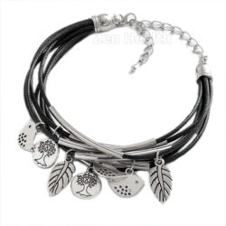 Nature Themed Charm Bracelet With Tree, Leaves and Bird Charms